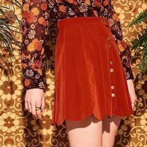 Katie Mae Orange Pipper Mini Skirt